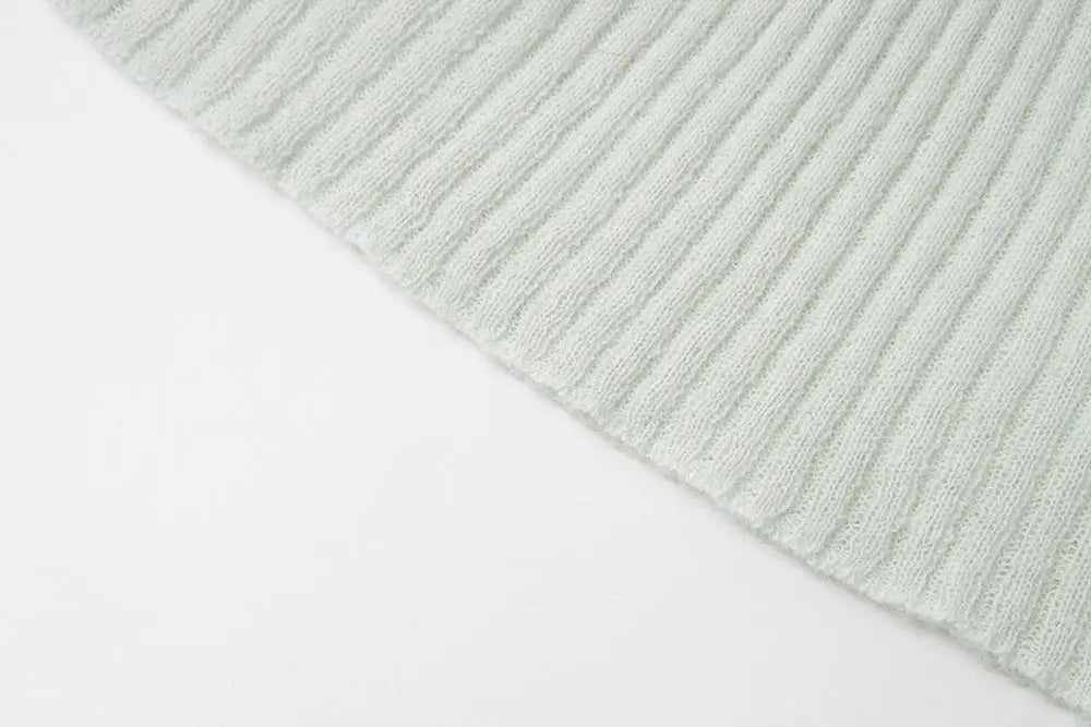 An image of a   11280 Ribbed Off-Shoulder Tie Knit by  Mirra Masa