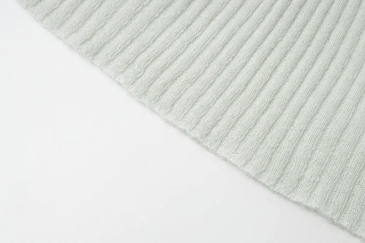 An image of a   11280 Ribbed Off-Shoulder Tie Knit by  Mirra Masa