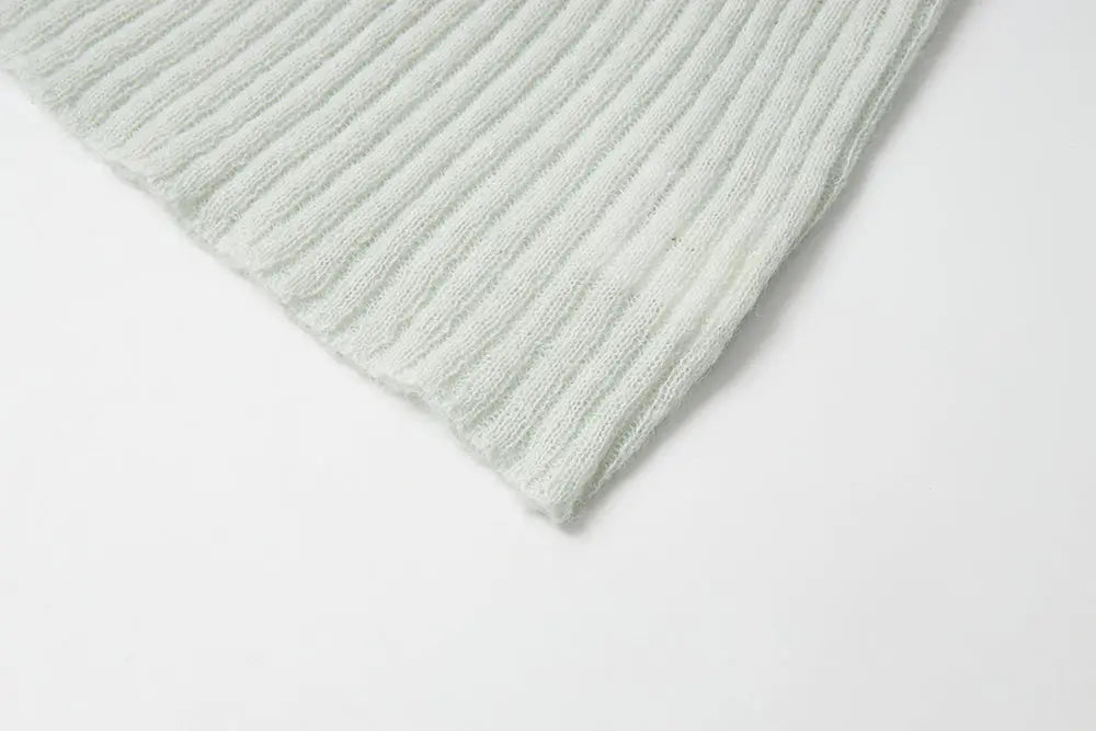 An image of a   11280 Ribbed Off-Shoulder Tie Knit by  Mirra Masa