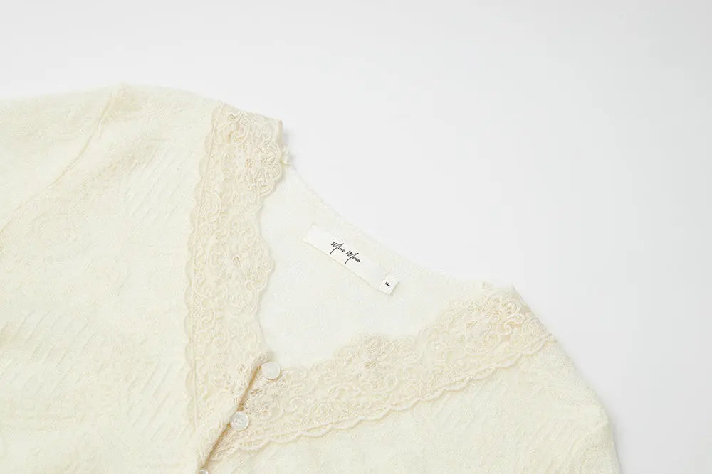 An image of a   11415 Lace Trim V-Neck Lyocell Blouse by  Mirra Masa