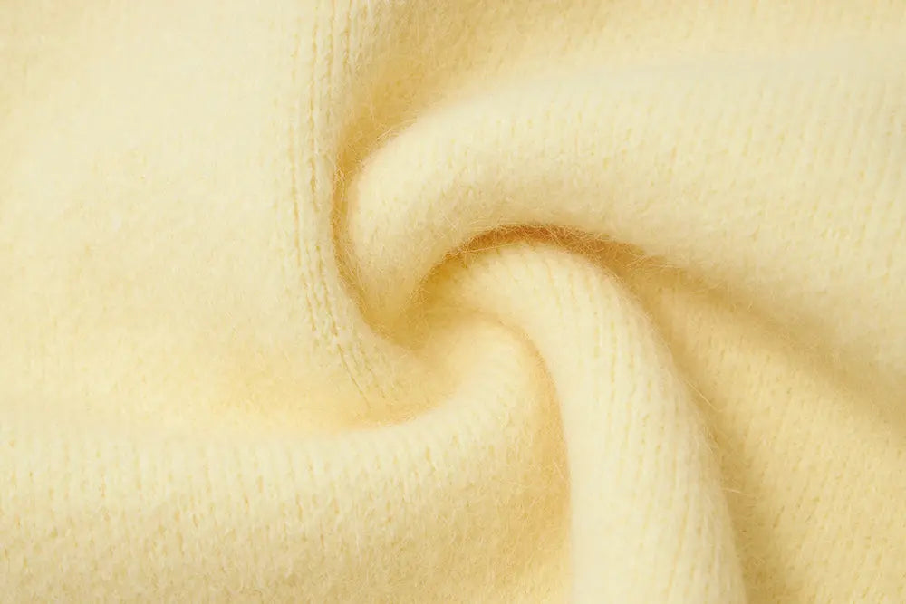 An image of a   11422 Round-Neck Off Shoulder Sweater by  Mirra Masa