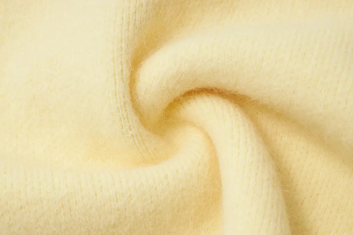 An image of a   11422 Round-Neck Off Shoulder Sweater by  Mirra Masa