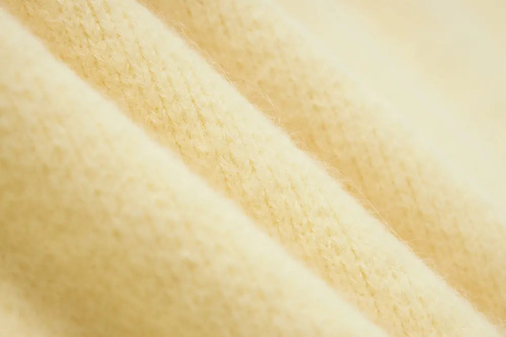 An image of a   11422 Round-Neck Off Shoulder Sweater by  Mirra Masa