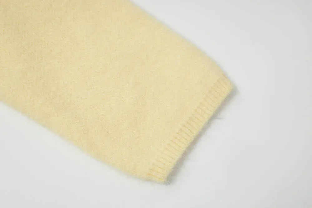 An image of a   11422 Round-Neck Off Shoulder Sweater by  Mirra Masa