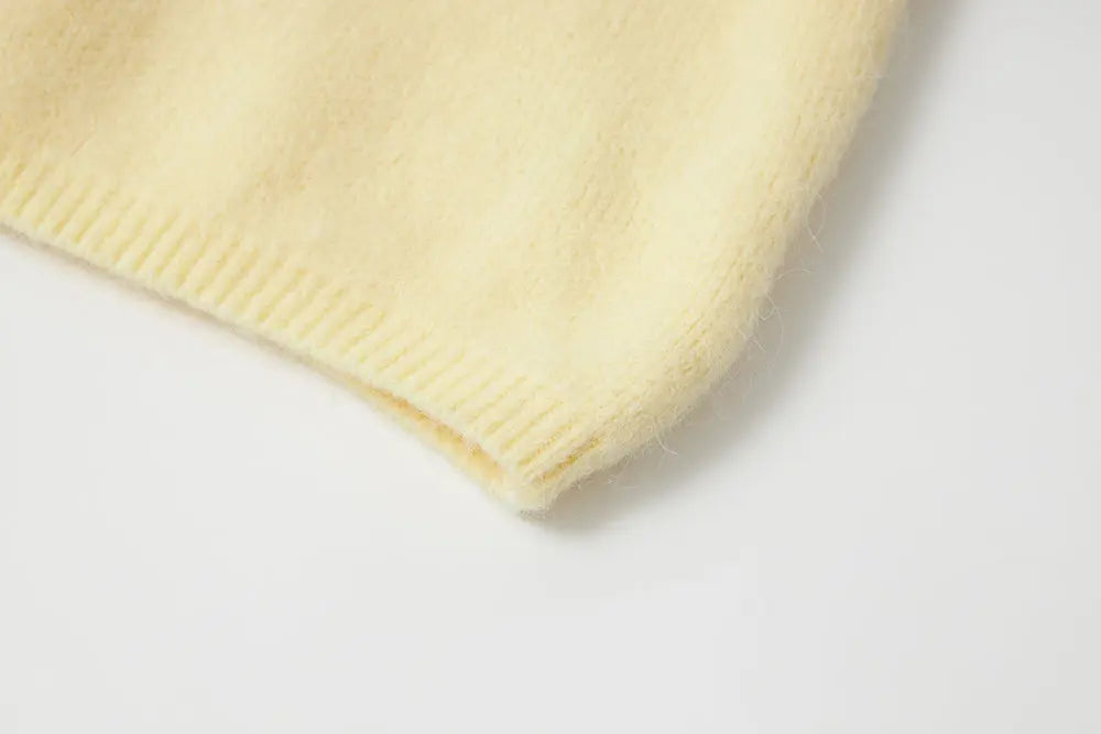 An image of a   11422 Round-Neck Off Shoulder Sweater by  Mirra Masa