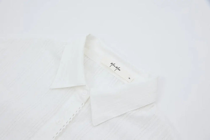 An image of a   11475 Textured Cotton Button-Down Shirt by  Mirra Masa