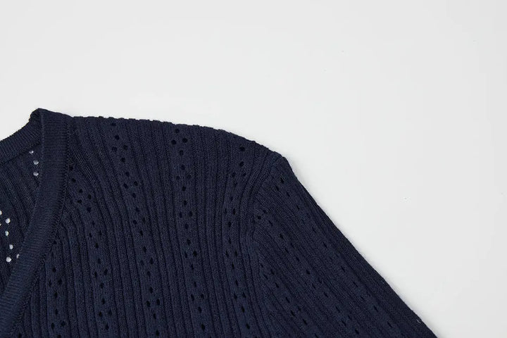 An image of a   11649 Pointelle Knit Cardigan by  Mirra Masa