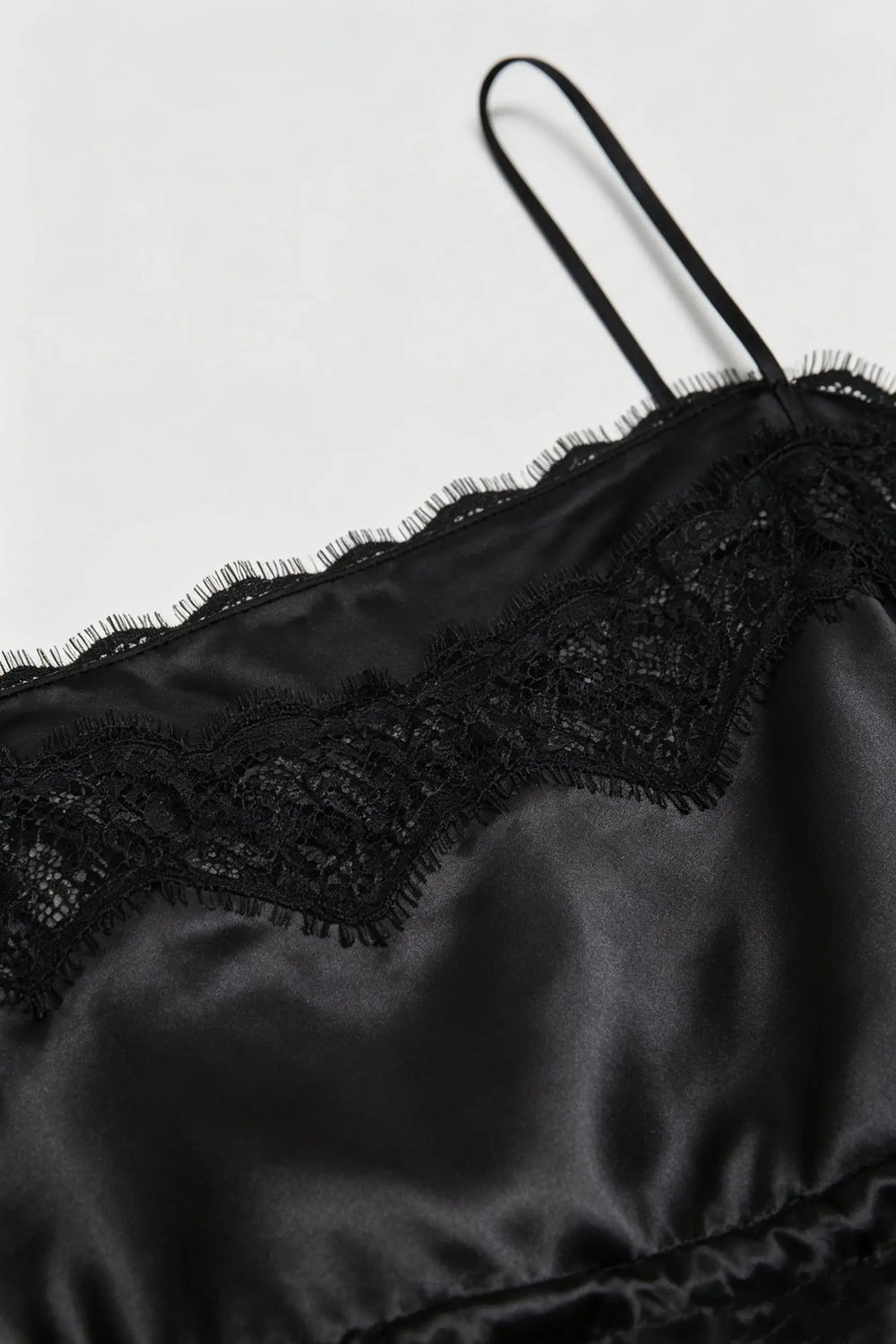 An image of a   11654 Lace-Trim Peplum Cami by  Mirra Masa