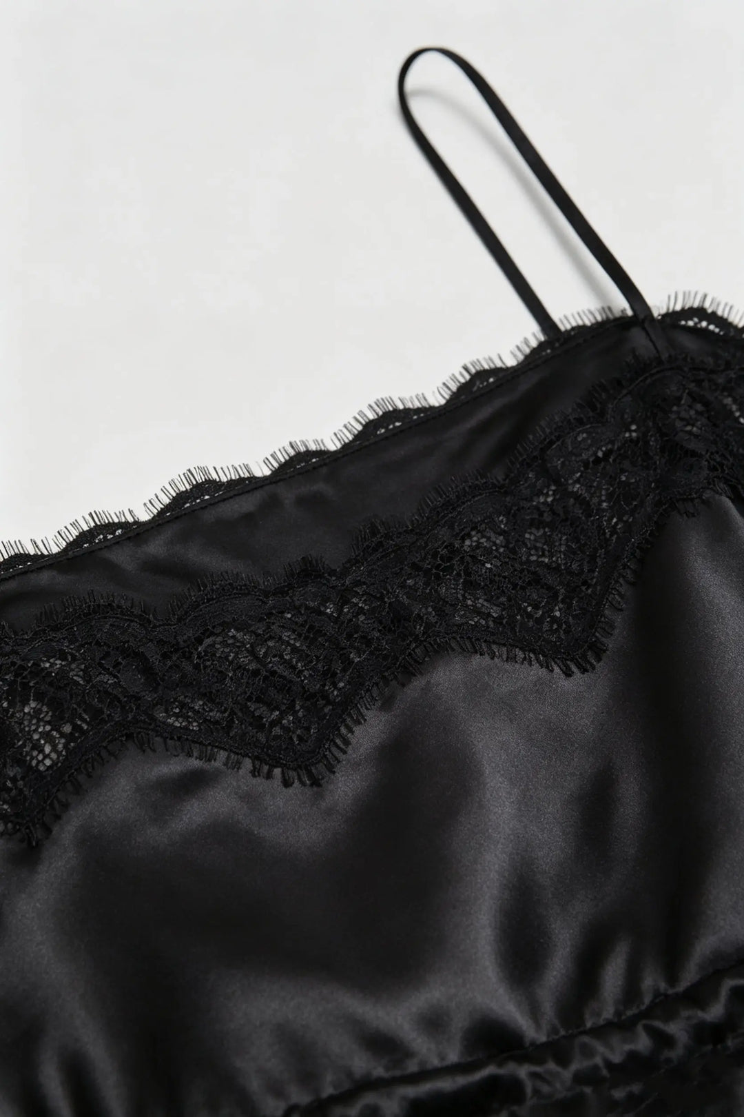 An image of a   11654 Lace-Trim Peplum Cami by  Mirra Masa