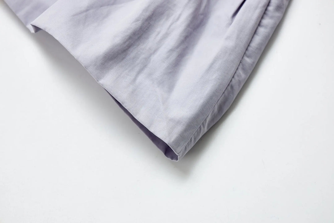 An image of a   11725 Fitted Slip Top by  Mirra Masa
