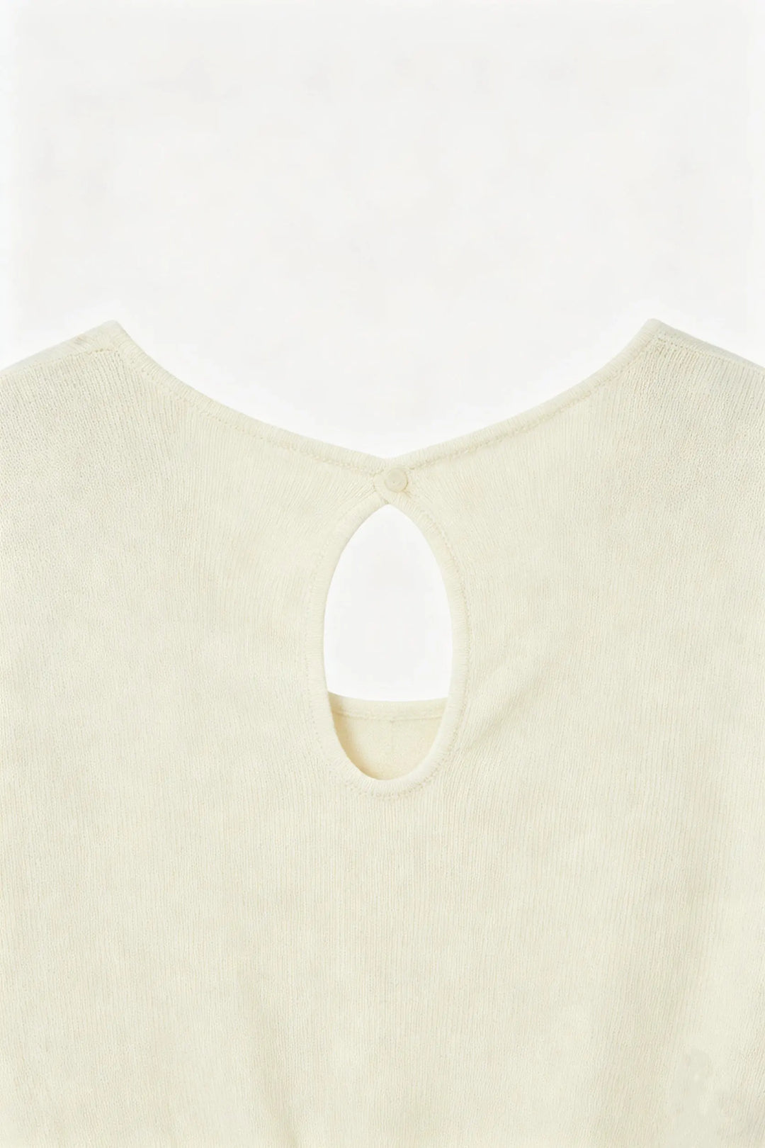 An image of a   11745 The Sculpted Cutout Top by  Mirra Masa