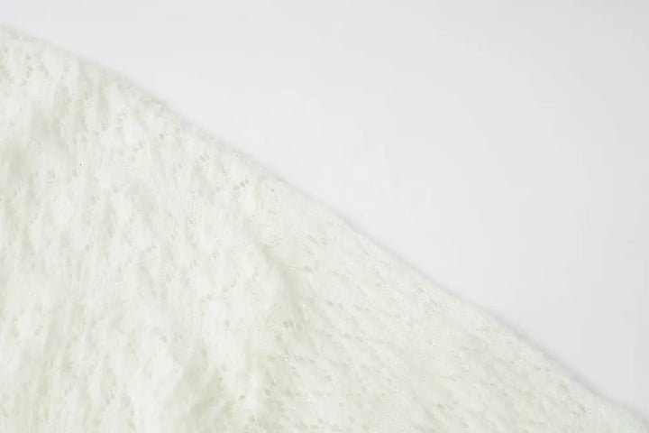 An image of a   11855 Pointelle Knit Wool Blend Cardigan by  Mirra Masa