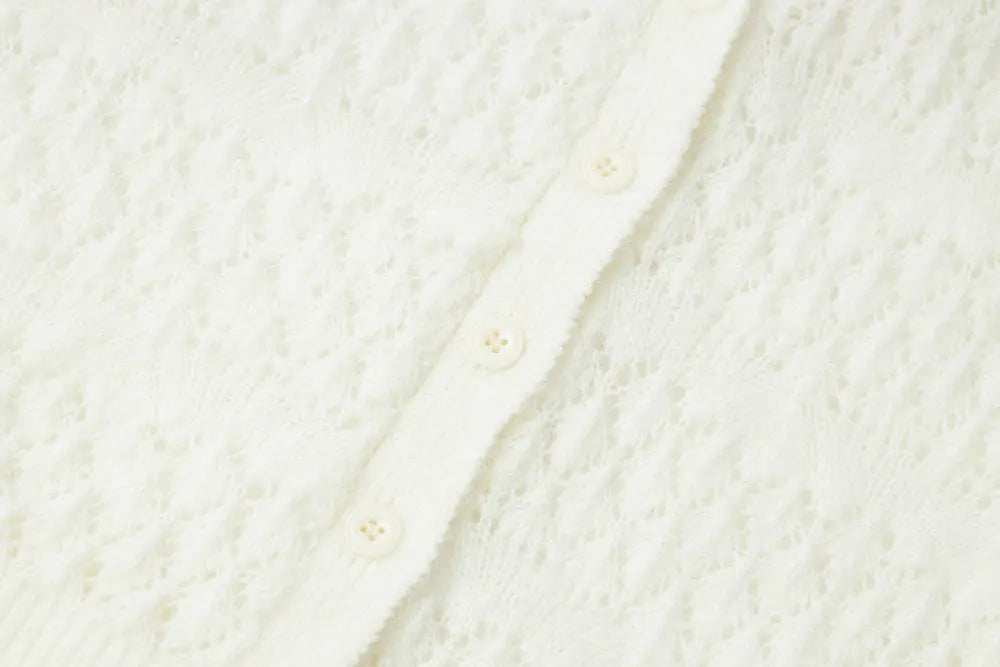 An image of a   11855 Pointelle Knit Wool Blend Cardigan by  Mirra Masa