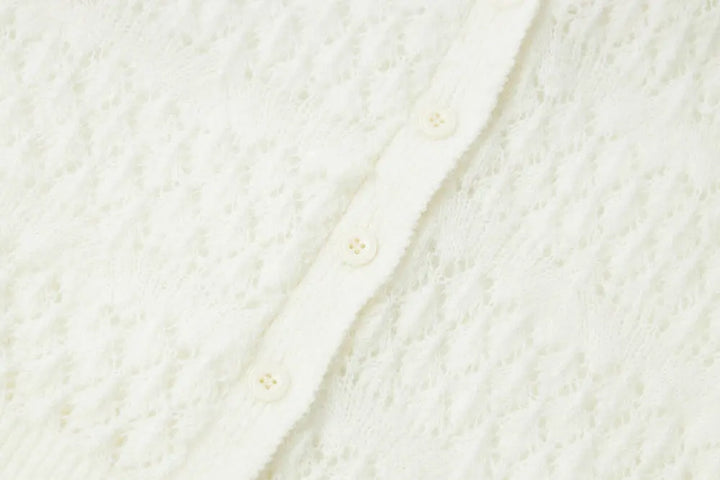 An image of a   11855 Pointelle Knit Wool Blend Cardigan by  Mirra Masa