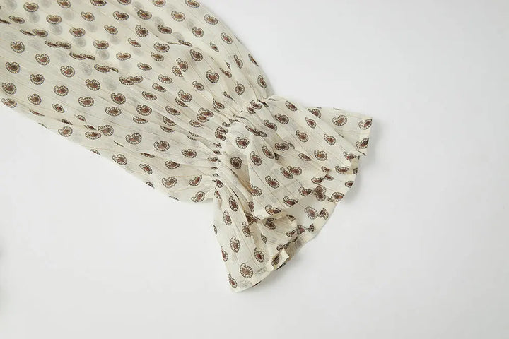 An image of a   11865 Ruffle Neck Polka Dot Blouse by  Mirra Masa