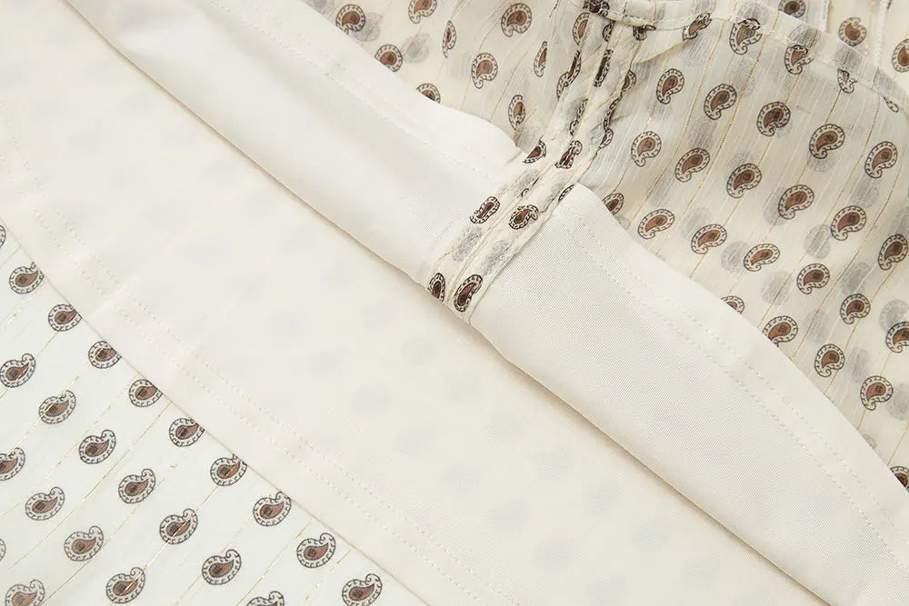 An image of a   11865 Ruffle Neck Polka Dot Blouse by  Mirra Masa