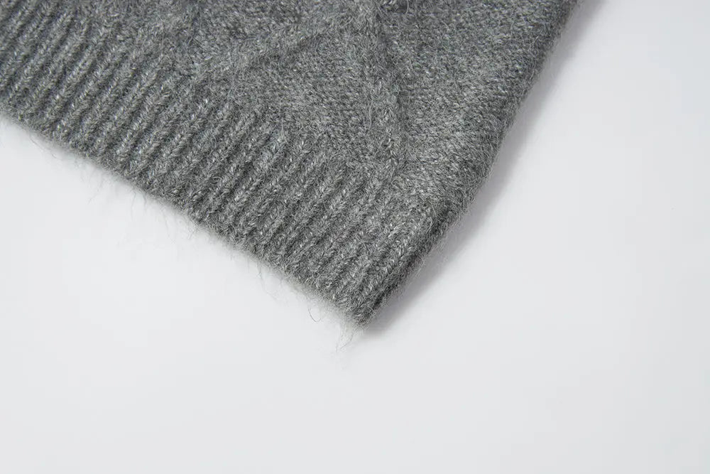 An image of a   11947 Cable Knit Sweater by  Mirra Masa