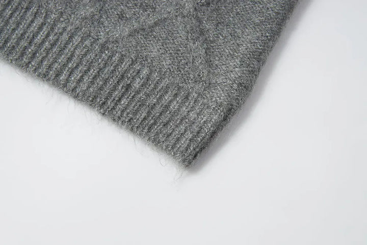 An image of a   11947 Cable Knit Sweater by  Mirra Masa