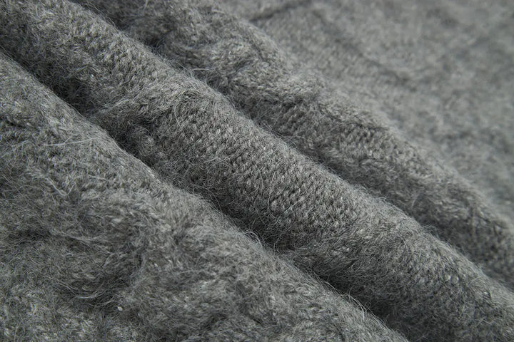 An image of a   11947 Cable Knit Sweater by  Mirra Masa