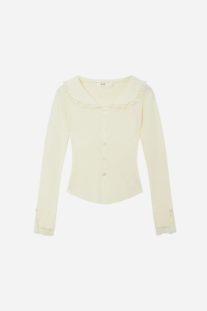 An image of a   11978 Ribbed and Fitted Layering Knit Top by  Mirra Masa