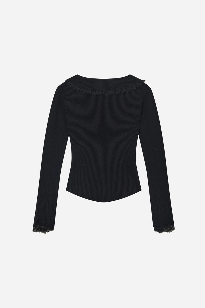 An image of a   11978 Ribbed and Fitted Layering Knit Top by  Mirra Masa