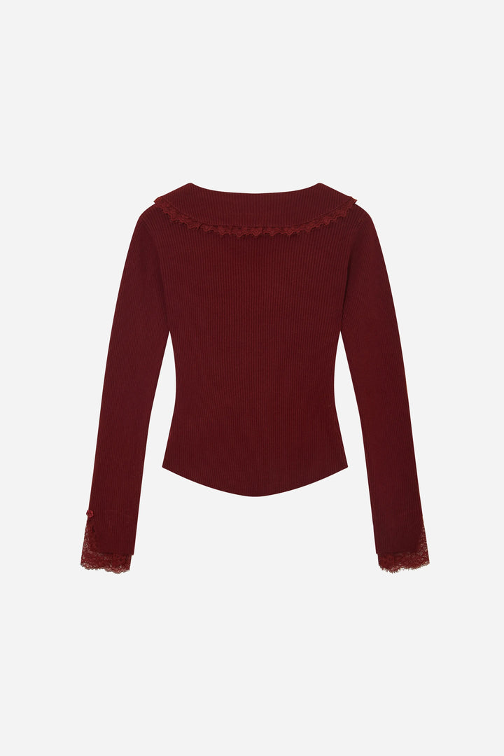 An image of a   11978 Ribbed and Fitted Layering Knit Top by  Mirra Masa