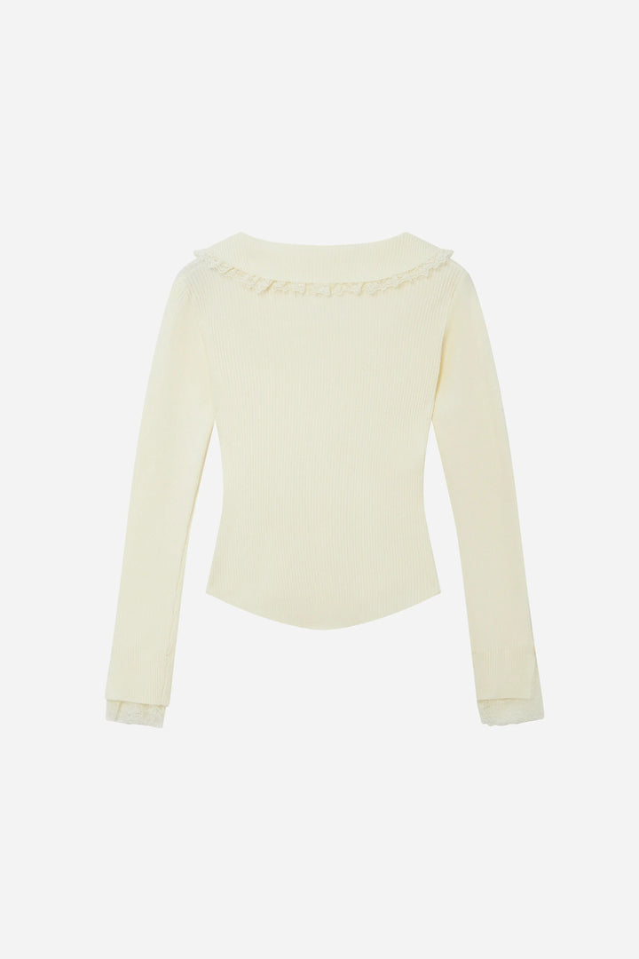 An image of a   11978 Ribbed and Fitted Layering Knit Top by  Mirra Masa