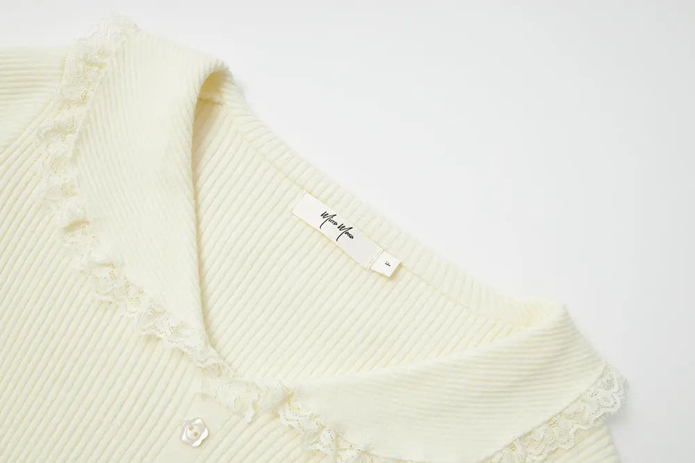 An image of a   11978 Ribbed and Fitted Layering Knit Top by  Mirra Masa