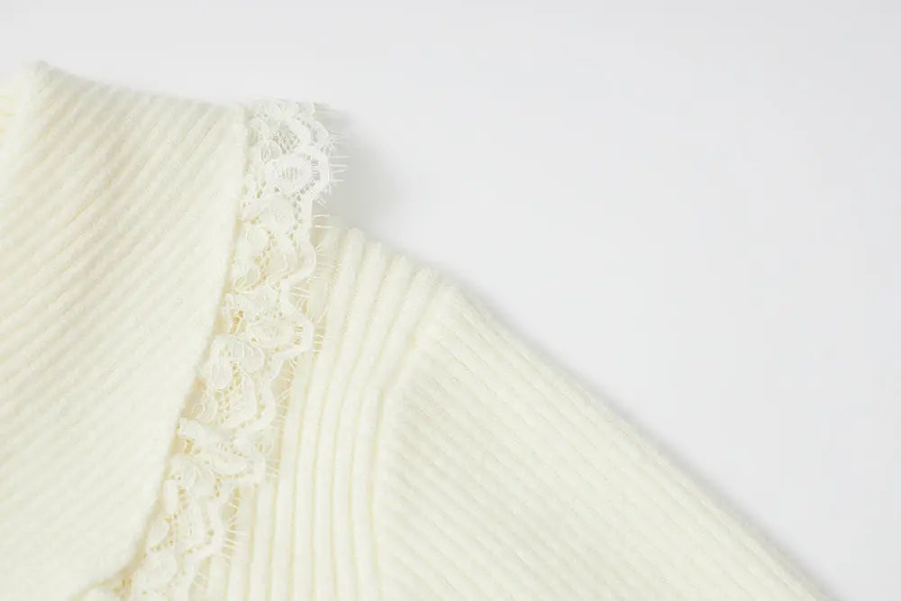 An image of a   11978 Ribbed and Fitted Layering Knit Top by  Mirra Masa