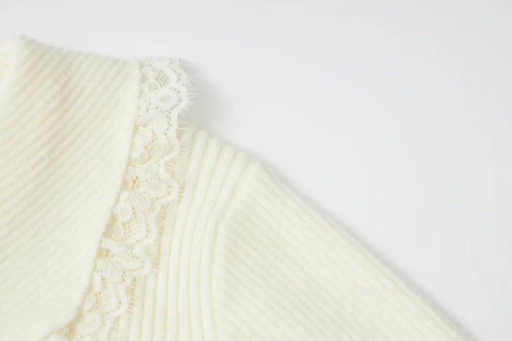 An image of a   11978 Ribbed and Fitted Layering Knit Top by  Mirra Masa