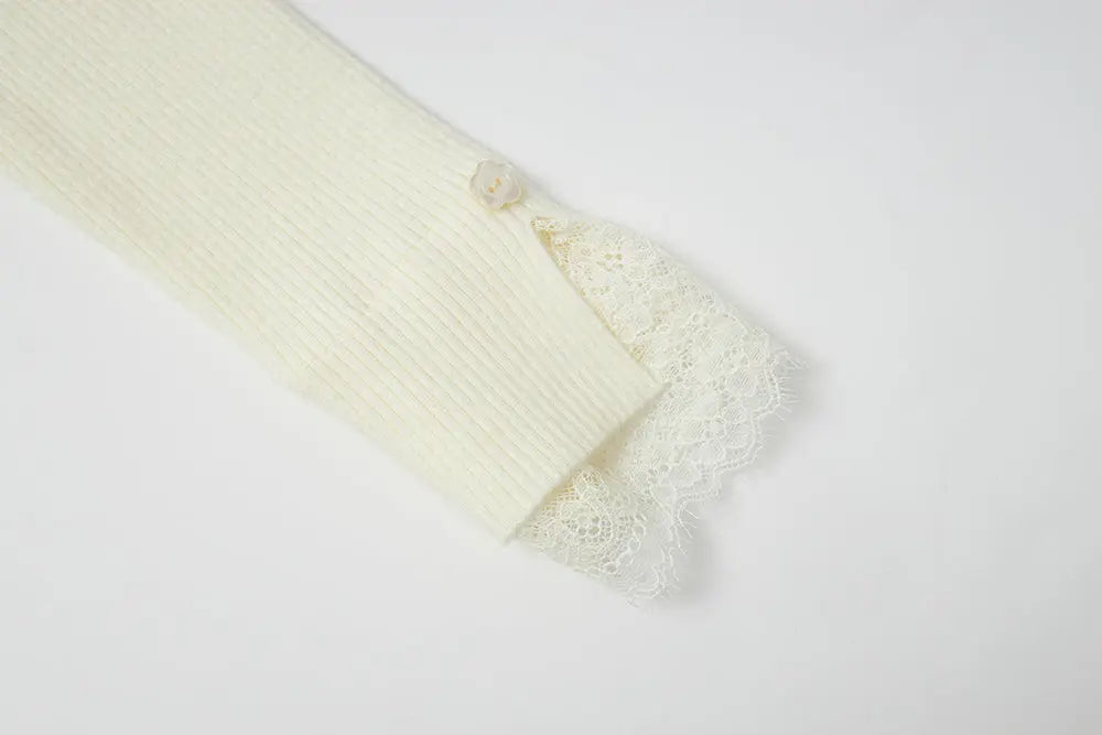 An image of a   11978 Ribbed and Fitted Layering Knit Top by  Mirra Masa