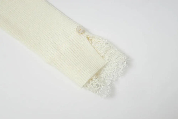 An image of a   11978 Ribbed and Fitted Layering Knit Top by  Mirra Masa