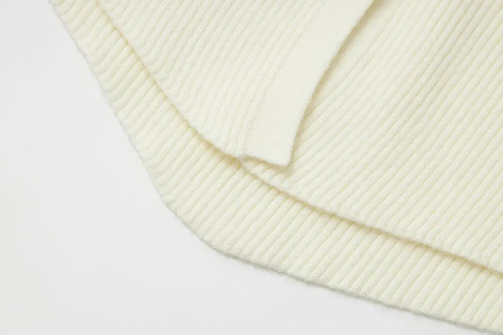 An image of a   11978 Ribbed and Fitted Layering Knit Top by  Mirra Masa