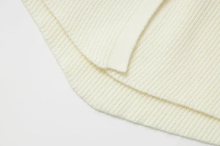 An image of a   11978 Ribbed and Fitted Layering Knit Top by  Mirra Masa