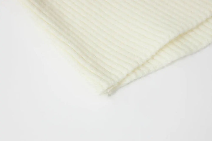 An image of a   11978 Ribbed and Fitted Layering Knit Top by  Mirra Masa