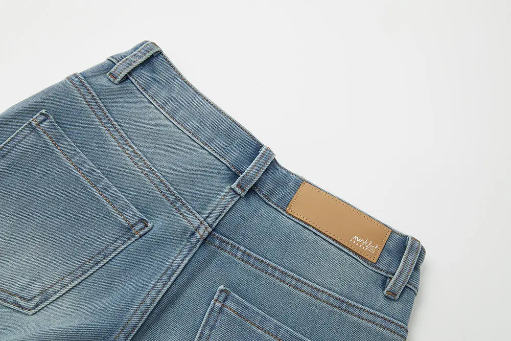 An image of a   12085 Light Wash Straight Leg Jeans by  Mirra Masa