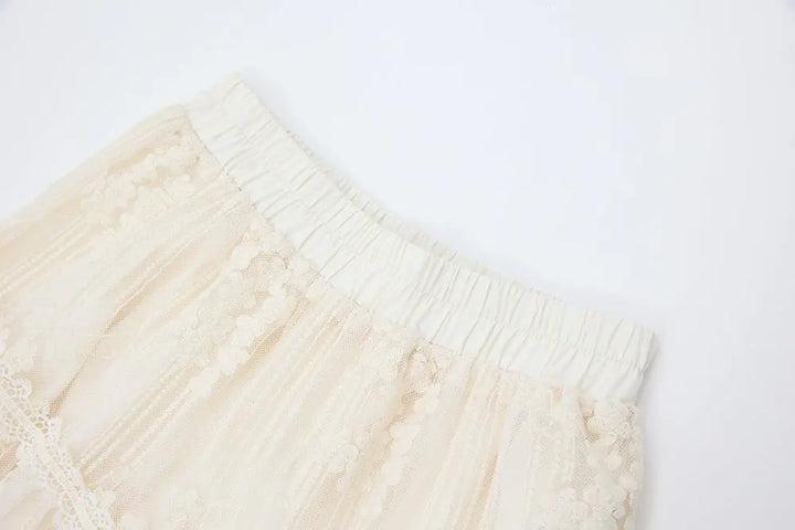 An image of a   12329 Cotton Broderie Tiered Maxi Skirt by  Mirra Masa