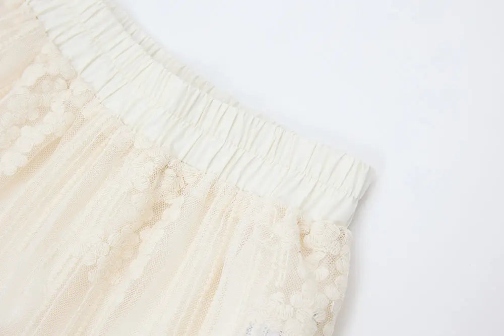 An image of a   12329 Cotton Broderie Tiered Maxi Skirt by  Mirra Masa