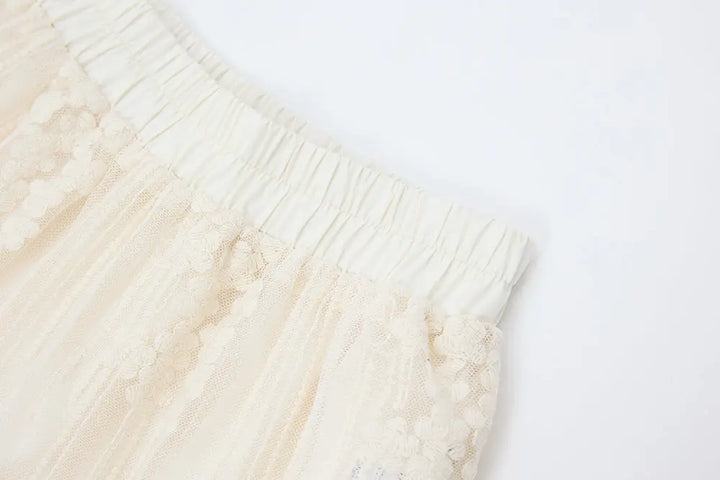 An image of a   12329 Cotton Broderie Tiered Maxi Skirt by  Mirra Masa