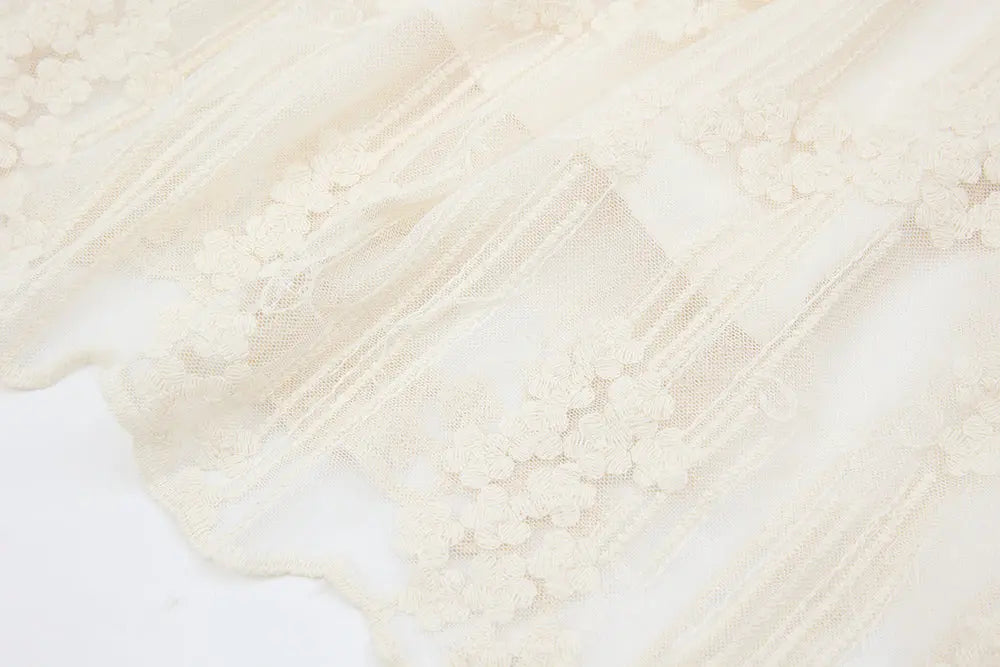 An image of a   12329 Cotton Broderie Tiered Maxi Skirt by  Mirra Masa