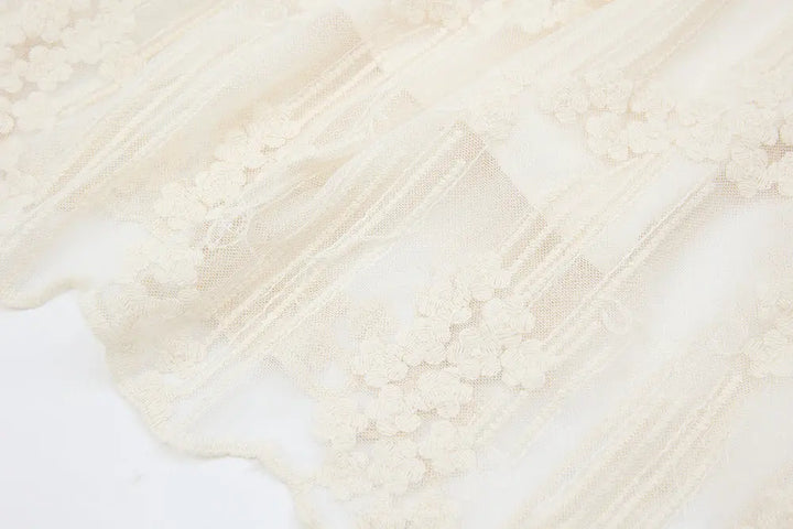 An image of a   12329 Cotton Broderie Tiered Maxi Skirt by  Mirra Masa