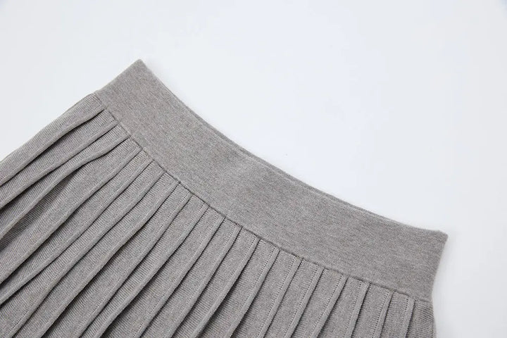 An image of a   12497 Solid Wool Blend Pleated Skirt by  Mirra Masa