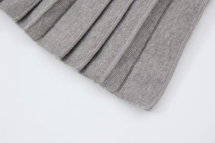 An image of a   12497 Solid Wool Blend Pleated Skirt by  Mirra Masa