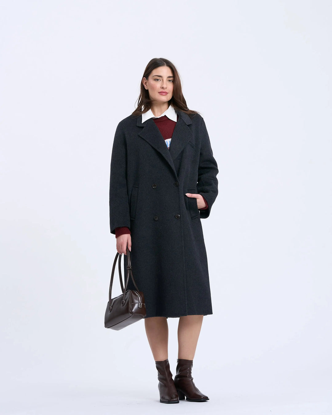 An image of a   1334D Long Wool Coat by  Mirra Masa