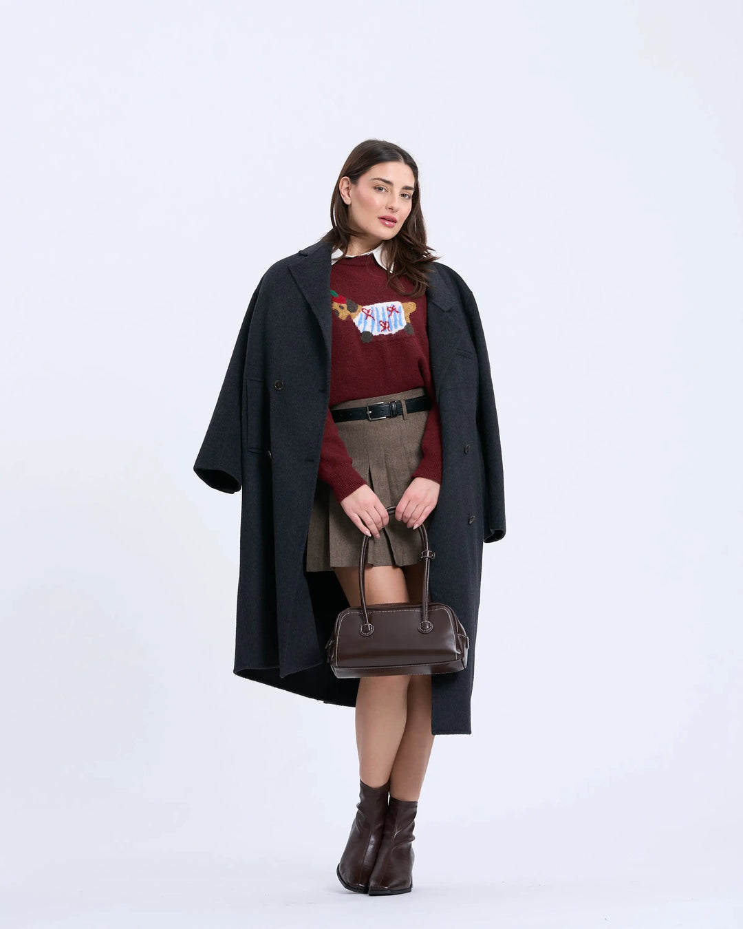 An image of a   1334D Long Wool Coat by  Mirra Masa