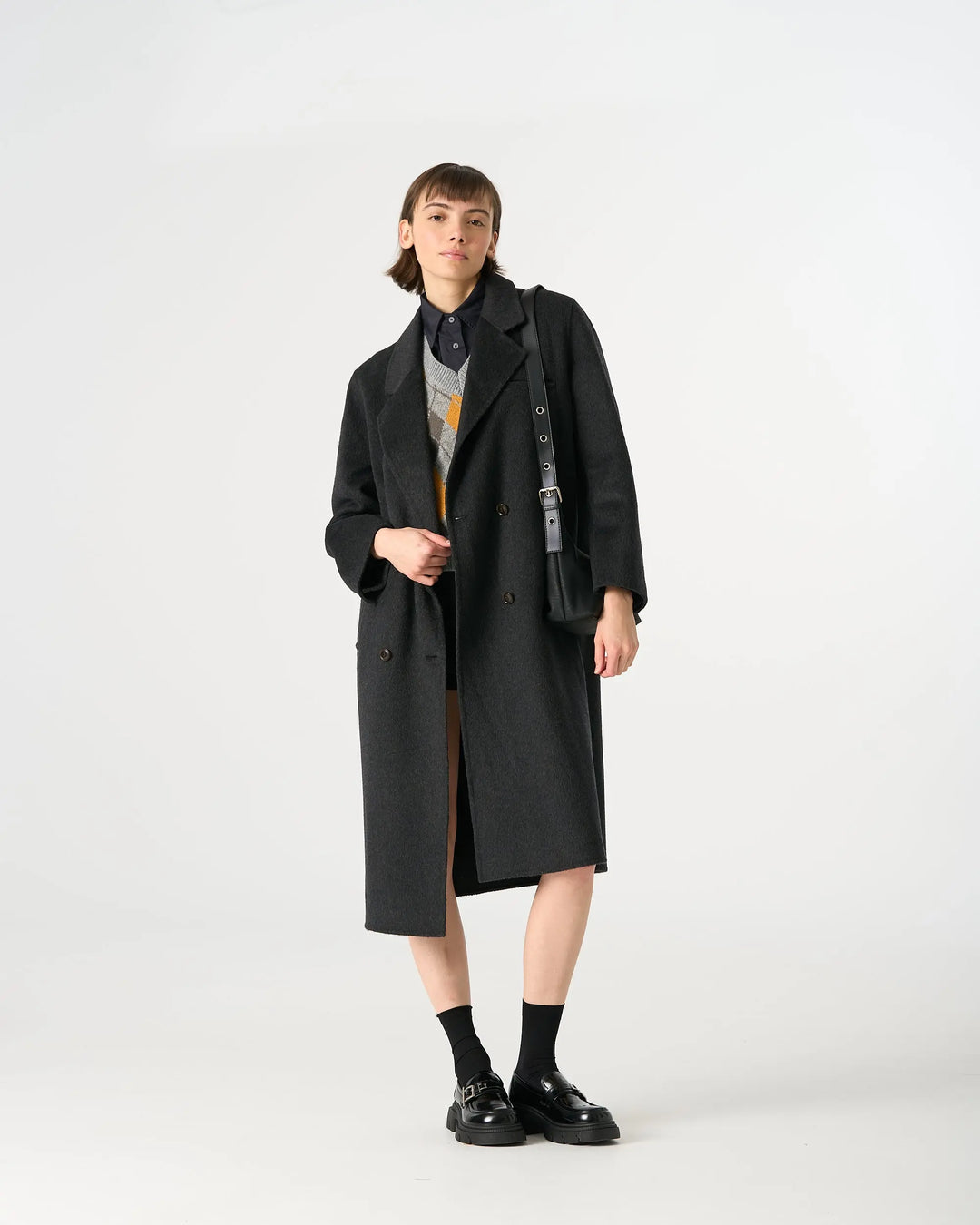 An image of a   1334D Long Wool Coat by  Mirra Masa