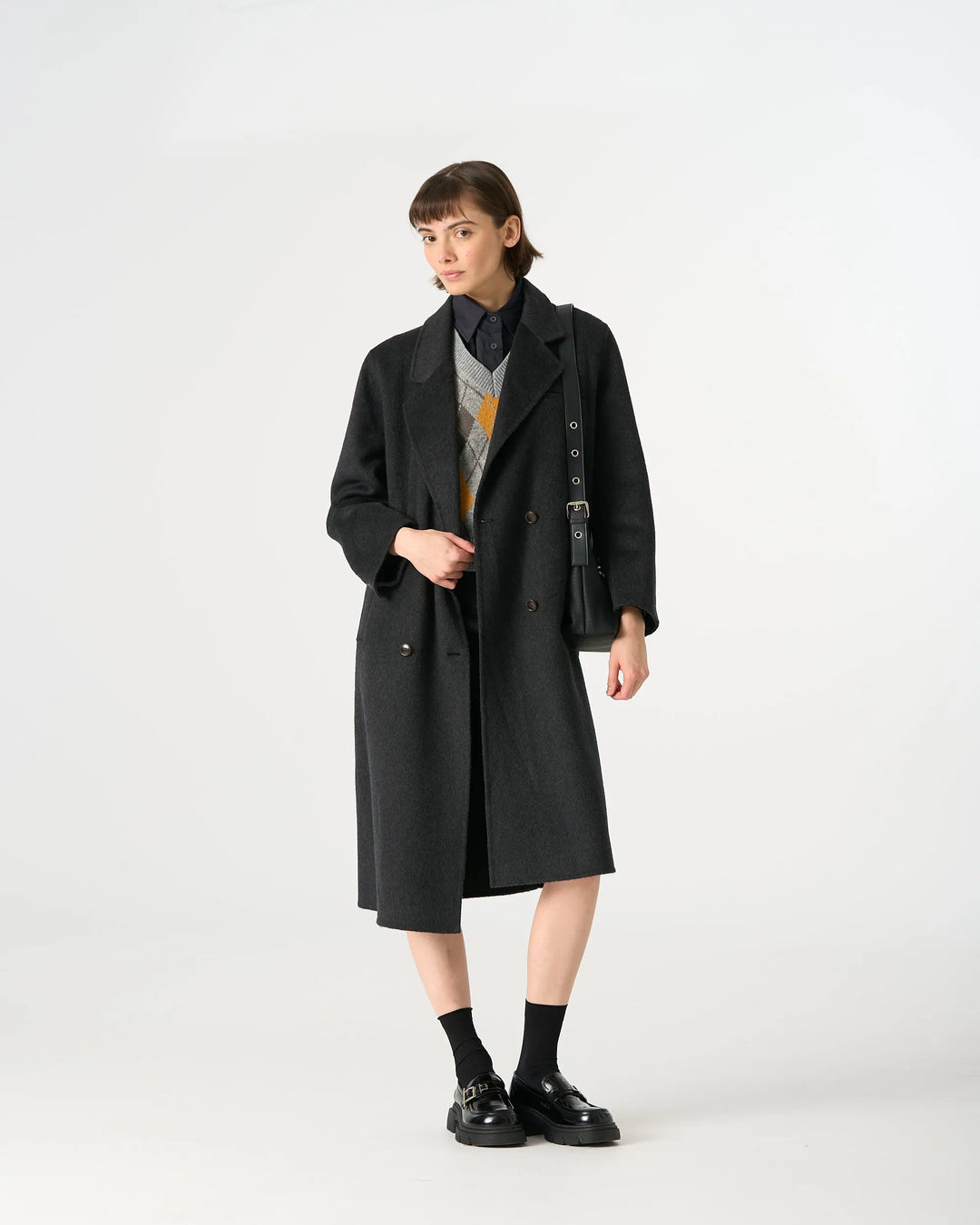 An image of a   1334D Long Wool Coat by  Mirra Masa