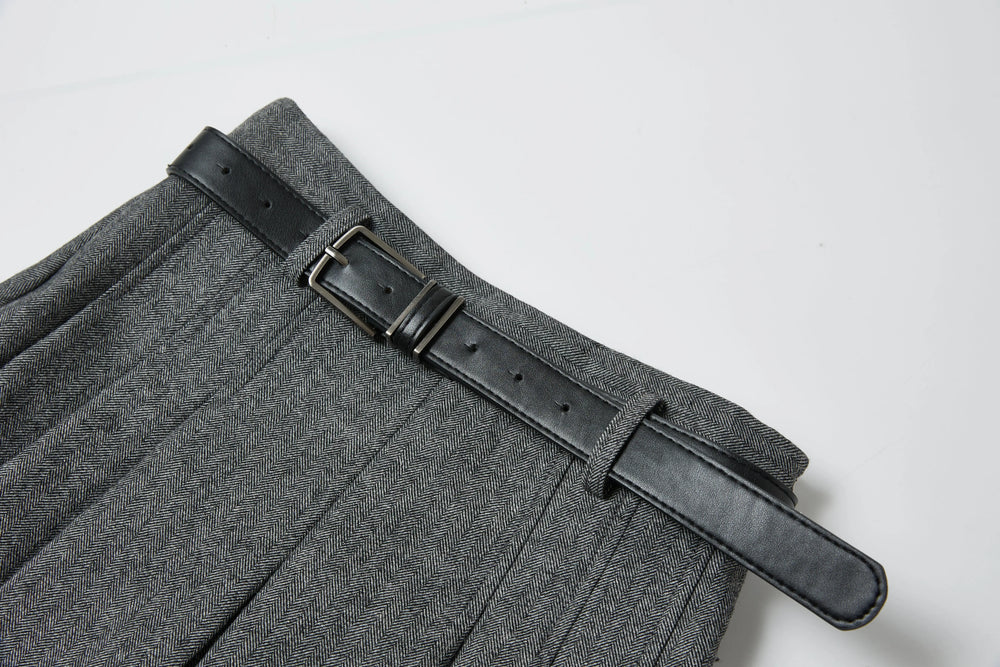 An image of a   1984Q Pleated Mini Skirt by  Mirra Masa