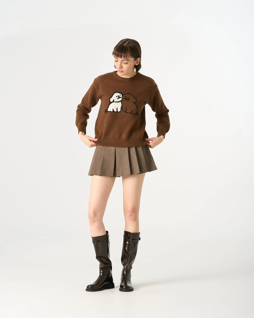 An image of a   1984Q Pleated Mini Skirt by  Mirra Masa