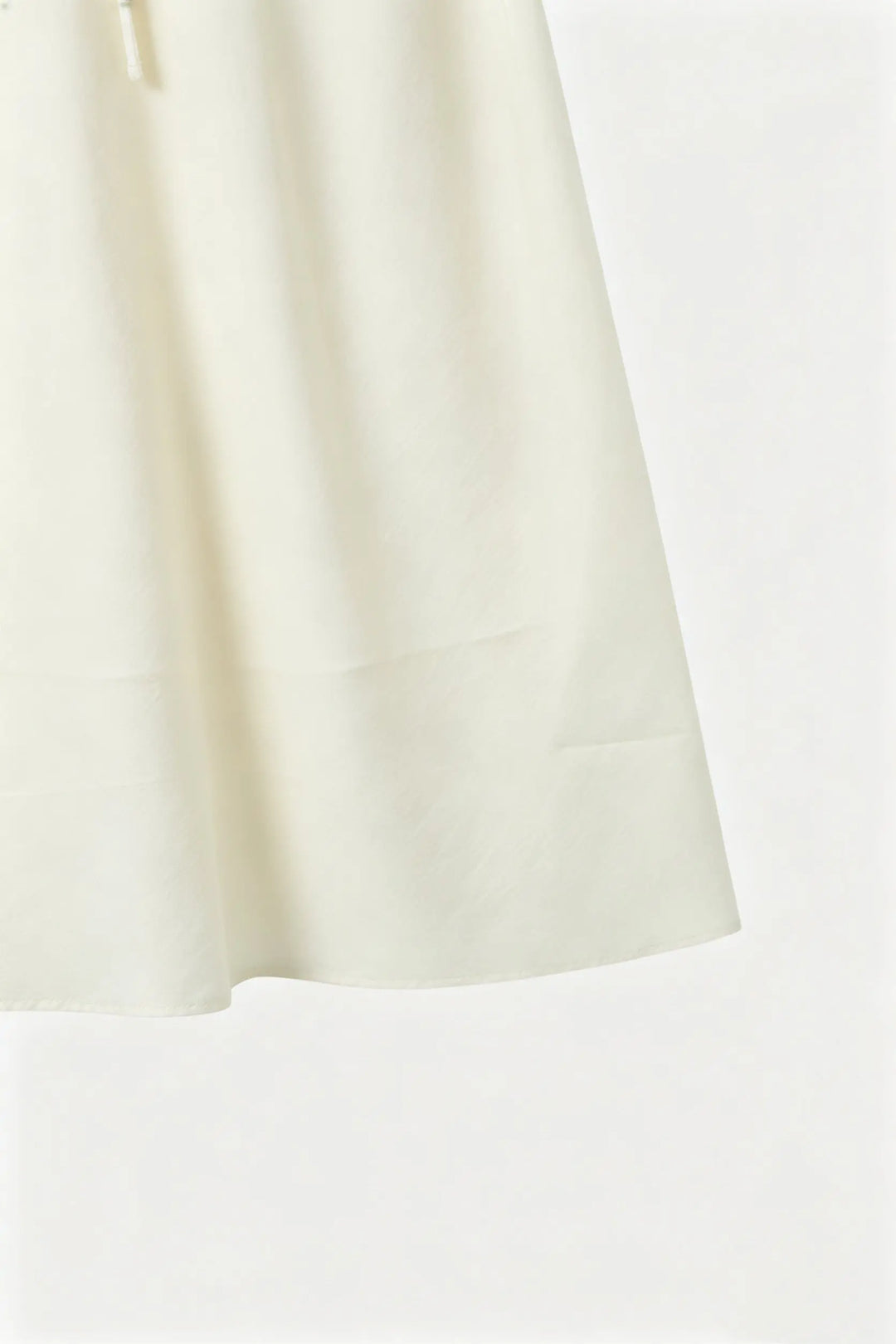 An image of a   20354OL Flowy Tencel Midi Skirt by  Mirra Masa